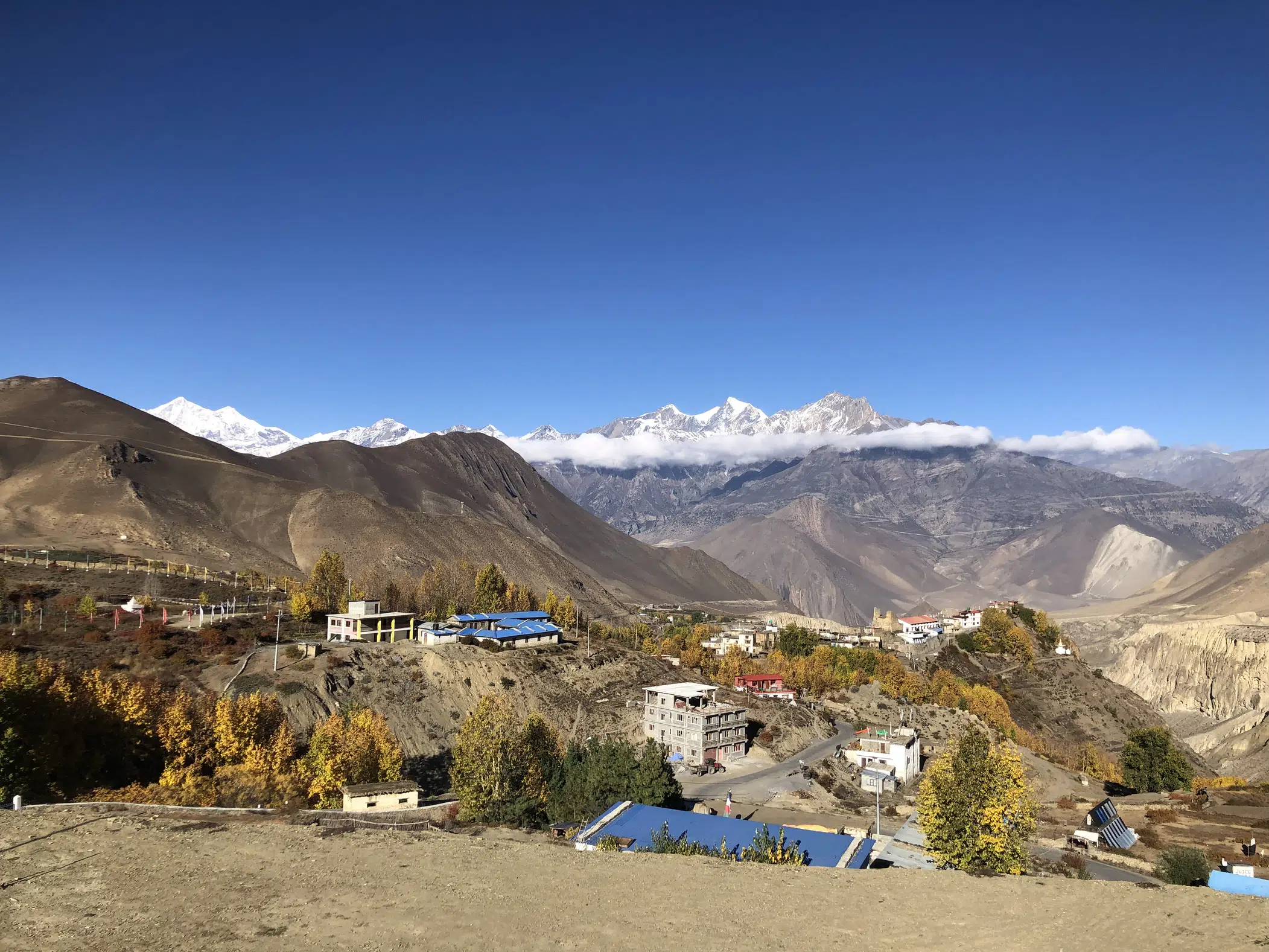 Mountain village surrounded by barren hills in Upper Mustang