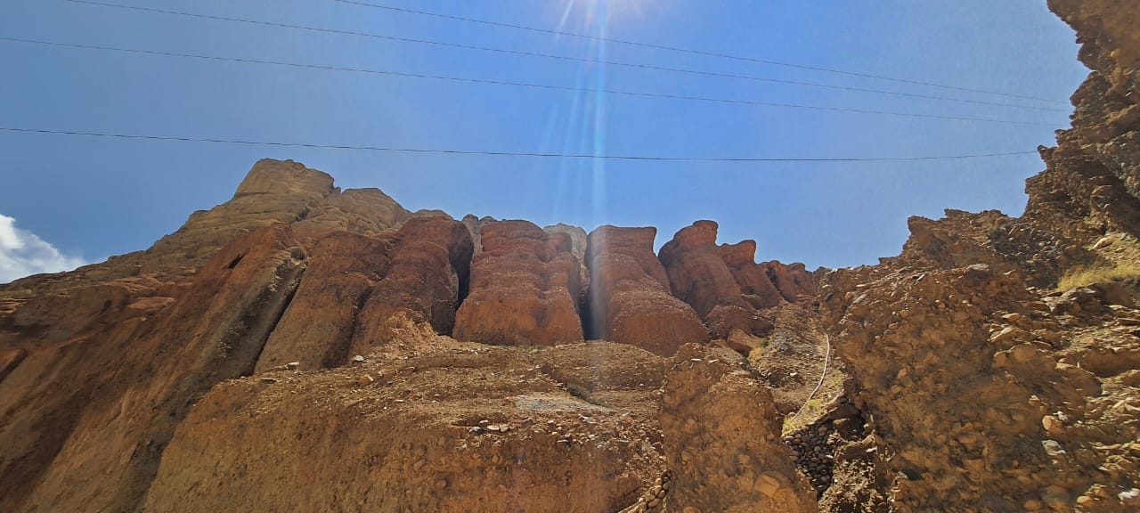 Red rock formations and rugged landscape of Upper Mustang